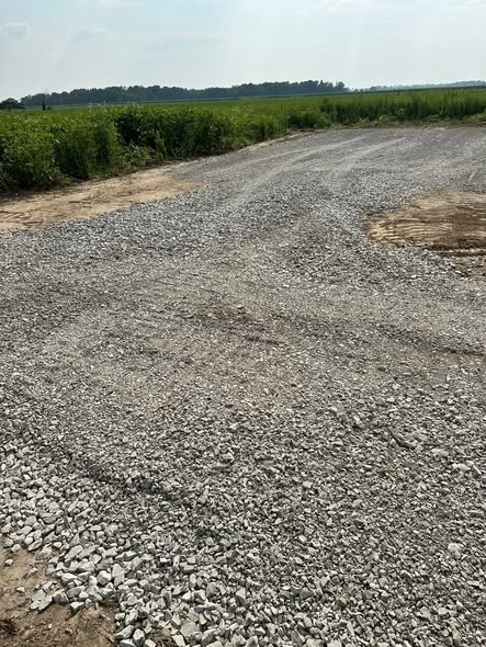 Gravel garage pad prepared on a rural property